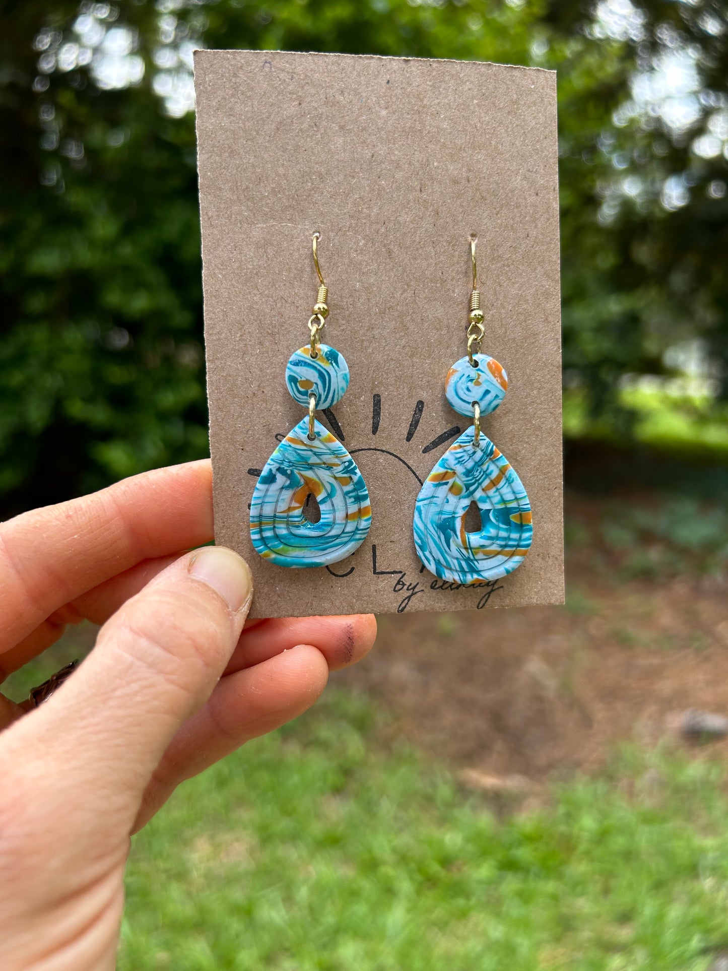 OP1 OPPOSITES ATTRACT Woven Teardrop